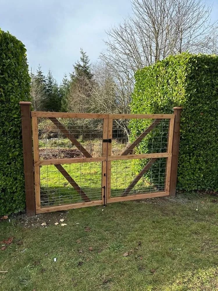 Hog wire fence installation by Cascade Fencing