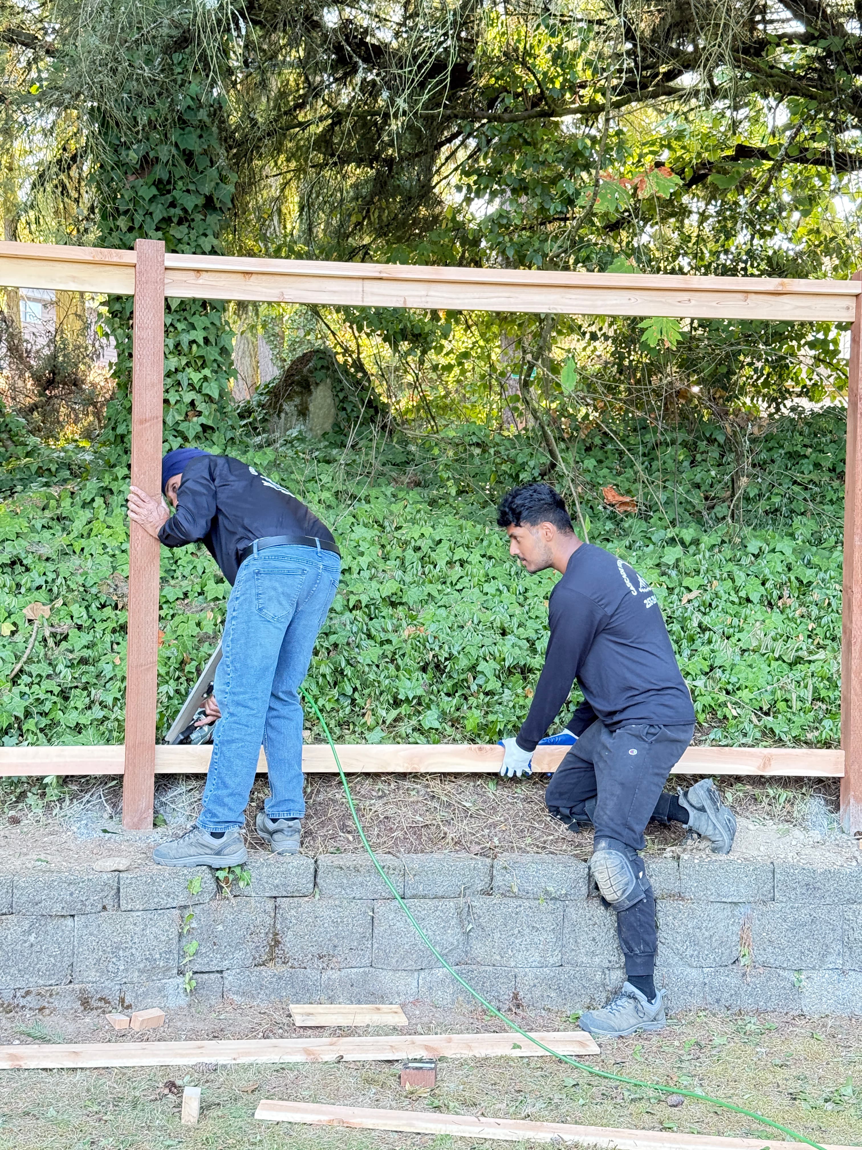 Cascade Fencing & Repair team working on professional fence installation in Pierce County