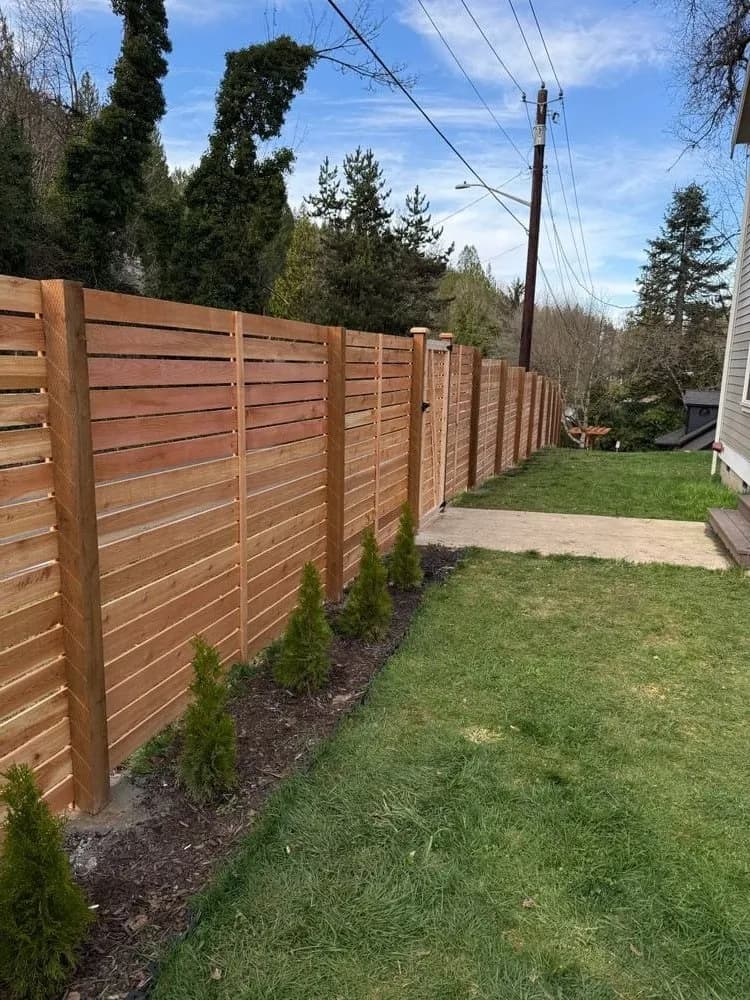 Modern horizontal cedar fence design